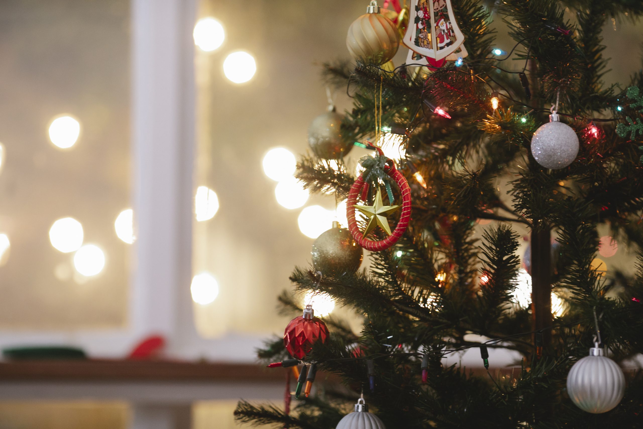 Christmas tree decorated with baubles and garland