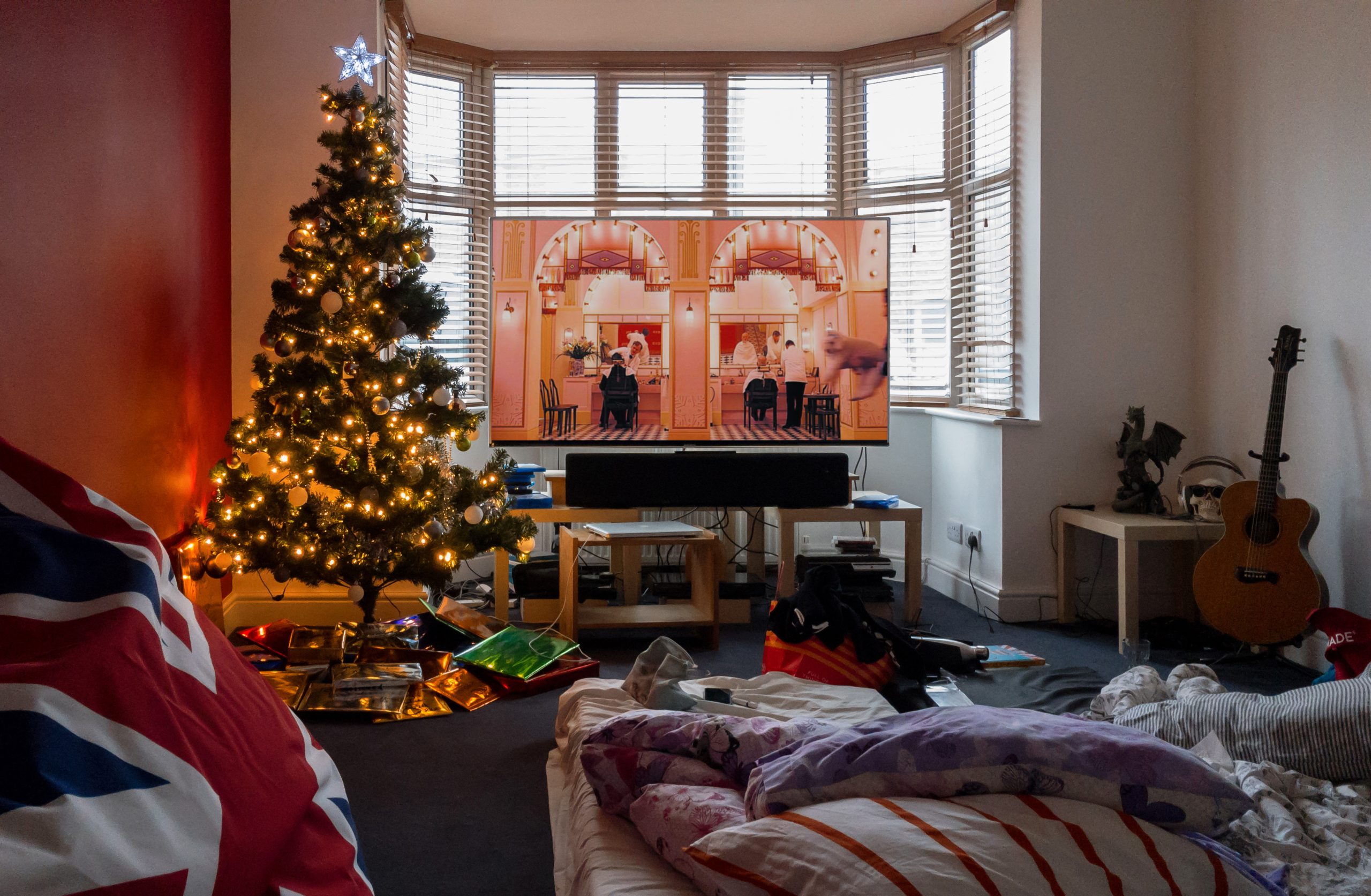 Photo of christmas tree near window