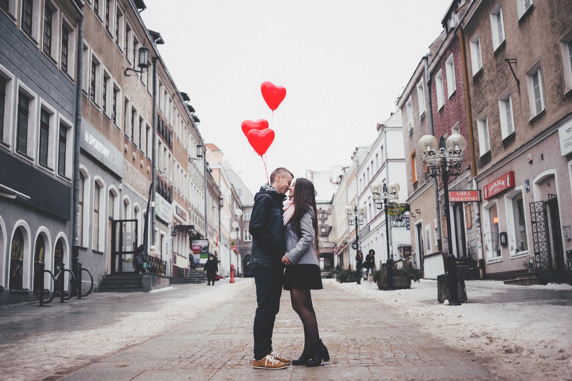 couple walking on city street